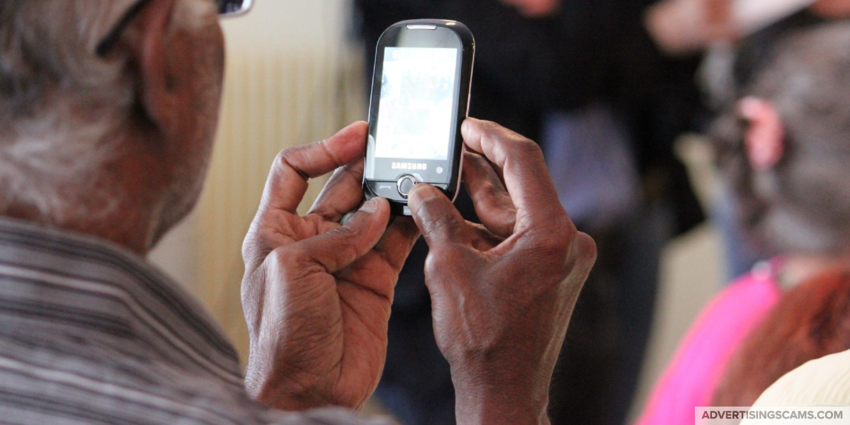 Senior looking at cell phone